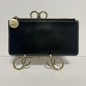 Chic Black Leather Pouch with Gold Zipper
